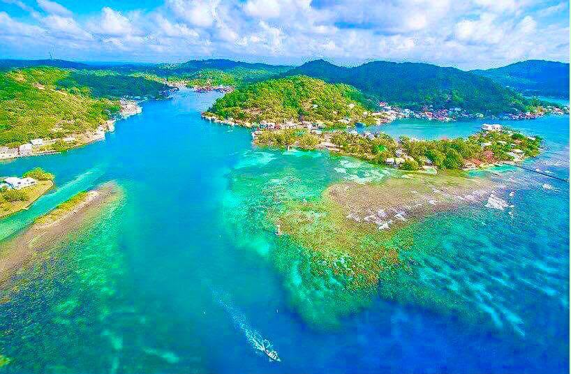 Aerial view of Roatán's turquoise coast and reef